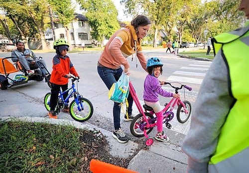 RUTH BONNEVILLE / WINNIPEG FREE PRESS

Standup - Back to school

Kim and Chad Celaire escort their children, Kamani (5yrs) and Jasmine (31/2) to Queenston School Wednesday.  Kamani is heading into grade 1 and Jasmine will start pre-school on Thursday.  

Sept  6th, 2023

