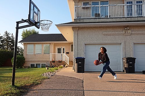 06092023
Mateo Landaverde-Cameron drives to the hoop while playing basketball with his brother Nico before their first day back to school on Wednesday morning. Mateo is in grade eight and Nico is in grade four. 
(Tim Smith/The Brandon Sun) 