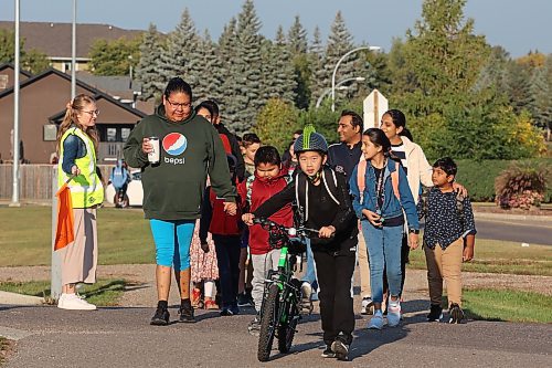 06092023
Kids make their way back to school with parents along Maryland Avenue on Wednesday morning for the first day of classes in Brandon.
(Tim Smith/The Brandon Sun) 