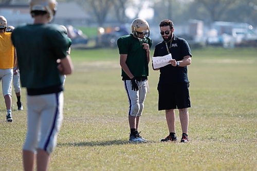 BROOK JONES / WINNIPEG FREE PRESS
Tec Voc High School Hornets coach Bret Gnutel talks with one of his players during practice at Tec Voc High School in Winnipeg, Man.., Wednesday, Sept. 6, 2023. The Hornets take to the gridiron against the visiting Beaver Brae Broncos in Winnipeg High School Football League AAA Division action at Tec Voc High School Thursday, Sept. 7, 2023. 