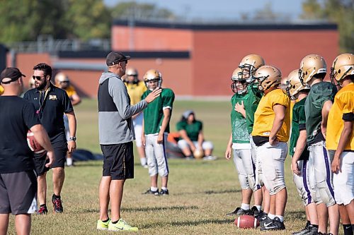 BROOK JONES / WINNIPEG FREE PRESS
Tec Voc High School Hornets head coach Ryan Karhut talks with his players during the team's practice at Tec Voc High School in Winnipeg, Man.., Wednesday, Sept. 6, 2023. The Hornets take to the gridiron against the visiting Beaver Brae Broncos in Winnipeg High School Football League AAA Division action at Tec Voc High School Thursday, Sept. 7, 2023. 