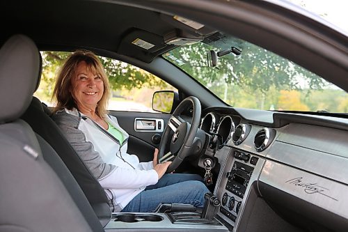 Patsy Desjardins sits behind the wheel of her 2008 Ford Mustang on Thursday. (Photos by Michele McDougall/The Brandon Sun) 