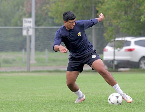 Reigning MCAC MVP Camilo Rodriguez dribbles during Brandon University Bobcats soccer practice on Thursday. (Thomas Friesen/The Brandon Sun)