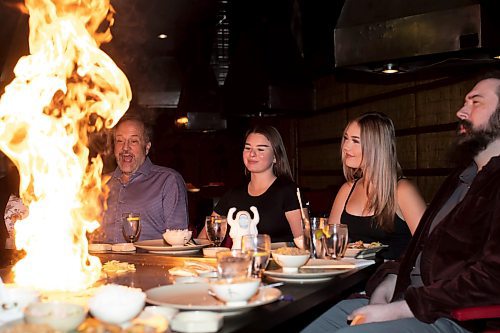 BROOK JONES / WINNIPEG FREE PRESS
Ichiban Japanese Steakhouse co-owern Keith Levit reacts to the flame, while dining at the local restaurant in Winnipeg, Man., Wednesday, Sept. 6, 2023. The art of Teppanyaki or iron cooking has been a Japanese tradition for more than 5,000. years. The Japanese steakhouse at 185 Carlton Street is celebrating its 50th anniversary. Pictured left to right: Ichiban Japanese Steakhouse co-owner Keith Levit, Lakeview Hotels &amp; Resorts marketing coorindator Brookelynn Blanco and Ichiban Japanese Steakhouse general manager Lawson Cherpako. 