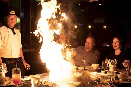 BROOK JONES / WINNIPEG FREE PRESS
Ichiban Japanese Steakhouse co-owern Keith Levit (second from far right) reacts to the flame, while dining at the local restaurant in Winnipeg, Man., Wednesday, Sept. 6, 2023. The Japanese steakhouse at 185 Carlton Street is celebrating its 50th anniversary. Pictured left to right: Ichiban chef Edwin Delacruz, Lakeview Hotels &amp; Resorts director of sales and marketing Carla Foster, Ichiban co-owner Keith Levit and Lakeview Hotels &amp; Resorts marketing coorindator Brookelynn Blanco.