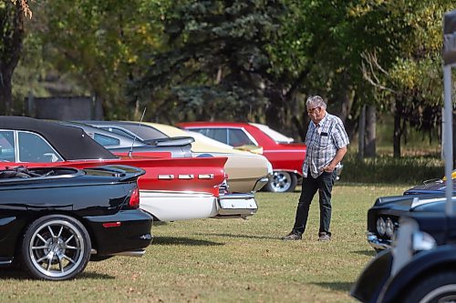 MIKE DEAL / WINNIPEG FREE PRESS
Doug McRae checks out some of the classic cars at Associated Auto Auction which is holding the largest collector car auction ever in Manitoba, with online pre-bidding starting Friday, September 8.
See Martin Cash  story
230907 - Thursday, September 07, 2023.