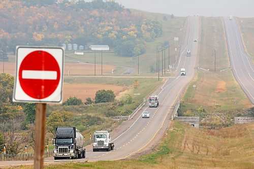 07092023
Trucks make their way along the Trans Canada Highway west of Brandon on Thursday.
(Tim Smith/The Brandon Sun)