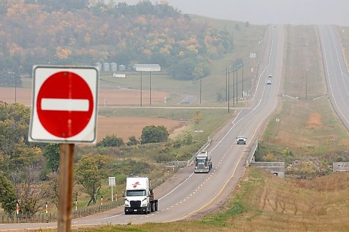 07092023
Trucks make their way along the Trans Canada Highway west of Brandon on Thursday.
(Tim Smith/The Brandon Sun)