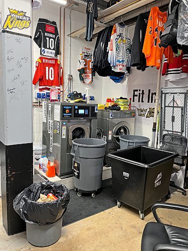 The Brandon Wheat Kings laundry room, which is located across from the wall of fame in the hallway that heads north from the main rink, has several machines plus a range of jerseys displayed. (Perry Bergson/The Brandon Sun)