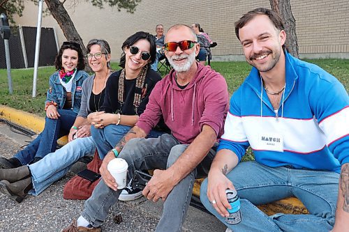 Musician Roman Clarke (far right) enjoys the opening acts of the inaugural Hatch festival Friday evening alongside his family members Erin, Monique, Sara and Cary. (Kyle Darbyson/The Brandon Sun)