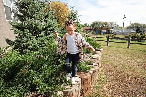 08092023
Four-year-old Rosalie Simard plays at the East End Community Centre on Friday afternoon.
(Tim Smith/The Brandon Sun)