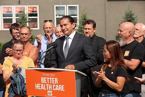 08092023
Manitoba NDP leader Wab Kinew speaks during an announcement at the East End Community Centre alongside local candidates Quentin Robinson for Brandon West (immediate left of Kinew) and Glen Simard for Brandon East (immediate right of Kinew) on Friday afternoon.
(Tim Smith/The Brandon Sun)
