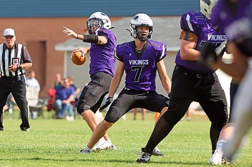 08092023
Quarterback Josh Palmer #8 of the Vincent Massey Vikings winds up for a pass during high school football action against the Grant Park Pirates on Friday. (Tim Smith/The Brandon Sun)