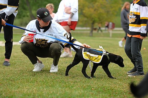 Defenceman Luke Shipley visits Kin Park Sunday morning, alongside some of his Brandon Wheat Kings teammates, to take part in the Brandon Humane Society’s 20th Wag-A-Tail Walk-A-Thon event. (Kyle Darbyson/The Brandon Sun)