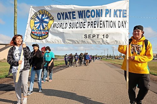 11092023
Students and community members take part in a walk on Monday for World Suicide Prevention Day at Sioux Valley Dakota Nation. (Tim Smith/The Brandon Sun)