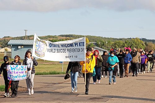 11092023
Students and community members take part in a walk on Monday for World Suicide Prevention Day at Sioux Valley Dakota Nation. (Tim Smith/The Brandon Sun)
