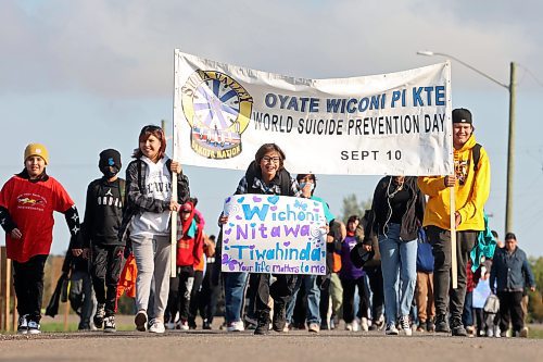 11092023
Students and community members take part in a walk on Monday for World Suicide Prevention Day at Sioux Valley Dakota Nation. (Tim Smith/The Brandon Sun)