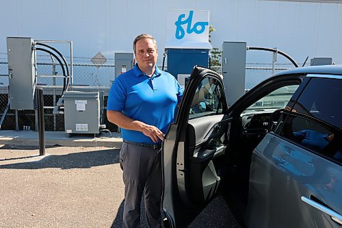 Murray Chevrolet Cadillac Buick GMC Brandon Dealer Principal Rich Pentney with the EV model of Cadillac Lyriq. (Abiola Odutola/The Brandon Sun)