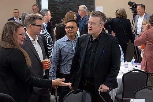 MIKE DEAL / WINNIPEG FREE PRESS
Premier Heather Stefanson (PC), Opposition Leader Wab Kinew (NDP) and Liberal Leader Dougald Lamont take part in the Manitoba Heavy Construction Association&#x2019;s Party Leaders Forum at the Holiday Inn Express, 1740 Ellice Avenue, early Tuesday morning.
See Gabby Piche story
230912 - Tuesday, September 12, 2023.