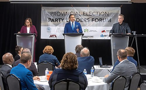 MIKE DEAL / WINNIPEG FREE PRESS
Premier Heather Stefanson (PC), Opposition Leader Wab Kinew (NDP) and Liberal Leader Dougald Lamont take part in the Manitoba Heavy Construction Association&#x2019;s Party Leaders Forum at the Holiday Inn Express, 1740 Ellice Avenue, early Tuesday morning.
See Gabby Piche story
230912 - Tuesday, September 12, 2023.