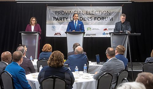 MIKE DEAL / WINNIPEG FREE PRESS
Premier Heather Stefanson (PC), Opposition Leader Wab Kinew (NDP) and Liberal Leader Dougald Lamont take part in the Manitoba Heavy Construction Association&#x2019;s Party Leaders Forum at the Holiday Inn Express, 1740 Ellice Avenue, early Tuesday morning.
See Gabby Piche story
230912 - Tuesday, September 12, 2023.