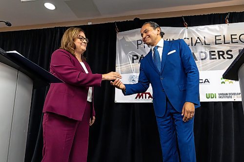 MIKE DEAL / WINNIPEG FREE PRESS
Premier Heather Stefanson (PC), Opposition Leader Wab Kinew (NDP) and Liberal Leader Dougald Lamont take part in the Manitoba Heavy Construction Association&#x2019;s Party Leaders Forum at the Holiday Inn Express, 1740 Ellice Avenue, early Tuesday morning.
See Gabby Piche story
230912 - Tuesday, September 12, 2023.