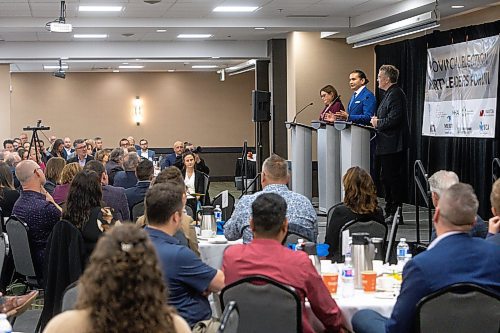 MIKE DEAL / WINNIPEG FREE PRESS
Premier Heather Stefanson (PC), Opposition Leader Wab Kinew (NDP) and Liberal Leader Dougald Lamont take part in the Manitoba Heavy Construction Association&#x2019;s Party Leaders Forum at the Holiday Inn Express, 1740 Ellice Avenue, early Tuesday morning.
See Gabby Piche story
230912 - Tuesday, September 12, 2023.