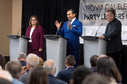 MIKE DEAL / WINNIPEG FREE PRESS
Premier Heather Stefanson (PC), Opposition Leader Wab Kinew (NDP) and Liberal Leader Dougald Lamont take part in the Manitoba Heavy Construction Association&#x2019;s Party Leaders Forum at the Holiday Inn Express, 1740 Ellice Avenue, early Tuesday morning.
See Gabby Piche story
230912 - Tuesday, September 12, 2023.