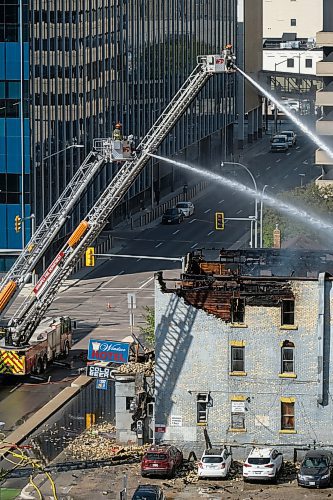 RUTH BONNEVILLE / WINNIPEG FREE PRESS

Fire crews battle a fire at the Windsor Hotel Wednesday.
September 13, 2023