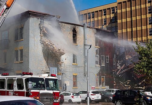 RUTH BONNEVILLE / WINNIPEG FREE PRESS

Local - Windsor Hotel Fire

Several Fire crews worked to put out a fully involved fire that engulfed the Windsor Hotel Wednesday.  Parts of the south  wall of the hotel collapsed onto parked cars next to the building as arial water trucks worked to contain the fire throughout the afternoon.  


See Tyler for more info.



Sept  12th, 2023

