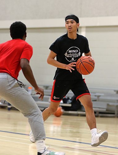 Montreal product John Dayo dribbles during his first month of Brandon University Bobcats men's basketball practices on Tuesday. Dayo transferred from Dawson College in Quebec this year. (Thomas Friesen/The Brandon Sun)