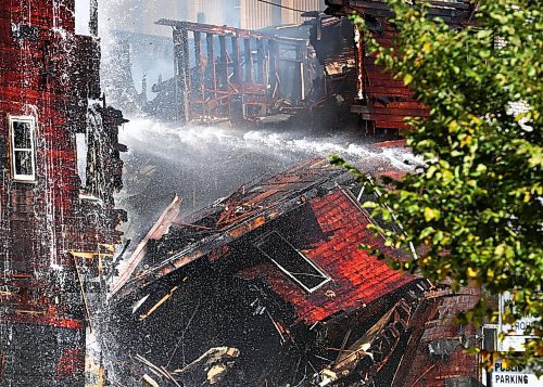 RUTH BONNEVILLE / WINNIPEG FREE PRESS

Local - Windsor Hotel Fire

Several Fire crews worked to put out a fully involved fire that engulfed the Windsor Hotel Wednesday.  Parts of the south  wall of the hotel collapsed onto parked cars next to the building as arial water trucks worked to contain the fire throughout the afternoon.  


See Tyler for more info.



Sept  12th, 2023

