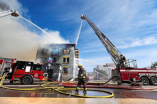 RUTH BONNEVILLE / WINNIPEG FREE PRESS

Local - Windsor Hotel Fire

Several Fire crews worked to put out a fully involved fire that engulfed the Windsor Hotel Wednesday.  Parts of the south  wall of the hotel collapsed onto parked cars next to the building as arial water trucks worked to contain the fire throughout the afternoon.  


See Tyler for more info.



Sept  12th, 2023

