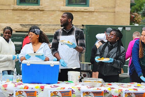 Brandon University officials and members of the local Sikh community serve up some free food Friday afternoon on campus during the school’s first-ever langar event. (Kyle Darbyson/The Brandon Sun)