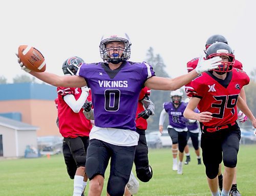 Hudson Brosseau scores the opening touchdown of Vincent Massey's 40-0 victory over the Sisler Spartans in their Winnipeg High School Football League AAAA game at Doug Steeves Field on Friday. See Page B1 for the full story. (Thomas Friesen/The Brandon Sun)
