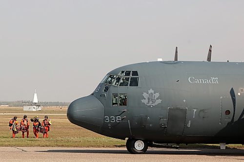 19092023
A Canadian Forces C130 Hercules taxis at Brandon Municipal Airport to pick up four military members after they parachuted from the aircraft and landed at the airport as part of training on Monday. (Tim Smith/The Brandon Sun)