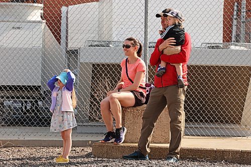 19092023
Jillian DeCosse and Mike Swim and their children Ruby Swim and Sam Swim watch a Canadian Forces C130 Hercules from Winnipeg taxi at Brandon Municipal Airport during military training on Monday. (Tim Smith/The Brandon Sun)