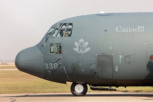 19092023
A Canadian Forces C130 Hercules prepares to take off from Brandon Municipal Airport after picking up four military members who parachuted from the aircraft and landed at the airport as part of training on Monday. (Tim Smith/The Brandon Sun)