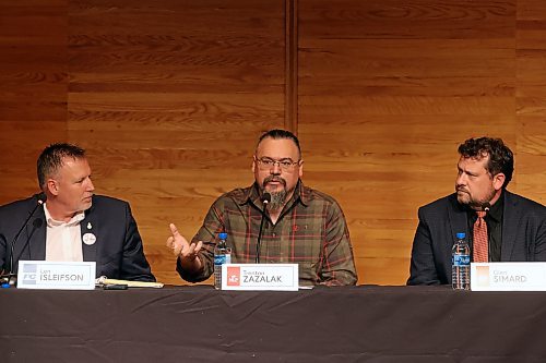 Trenton Zazalak of the Manitoba Liberal Party speaks while fellow Brandon East candidates Len Isleifson of the Progressive Conservatives and Glen Simard of the NDP listen during a debate hosted by the Brandon Sun, Brandon University, Westman Communications Group, the Brandon Teachers’ Association and CUPE Local 737 at BU’s Lorne Watson Recital Hall on Tuesday in advance of the upcoming provincial election. See debate coverage on Page A3. (Tim Smith/The Brandon Sun)