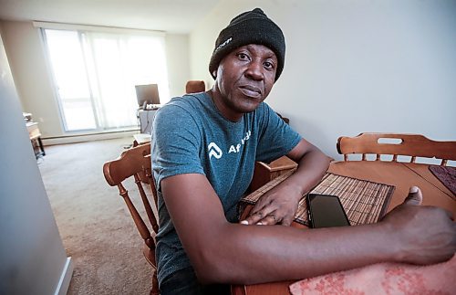 JOHN WOODS / WINNIPEG FREE PRESS
John Adigwe, who immigrated from Nigeria last year in hopes of getting a good job is photographed in his apartment in downtown Winnipeg Tuesday, September 19, 2023. He did not get a good paying job and is now barely getting by. He says two-thirds of his earnings go to rent.

Reporter: ?