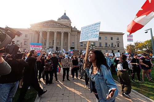 MIKE DEAL / WINNIPEG FREE PRESS
An Anti-trans protester shouts at the crowd during a protest on the grounds of the Manitoba Legislative building where Trans Rights supporters showed up to counter protest Wednesday morning.
230920 - Wednesday, September 20, 2023.
