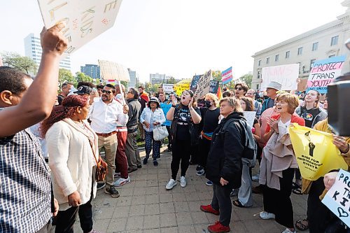 MIKE DEAL / WINNIPEG FREE PRESS
Trans Rights supporters (right) and Anti-trans protesters (left) shout at each other on the grounds of the Manitoba Legislative building Wednesday morning.
230920 - Wednesday, September 20, 2023.