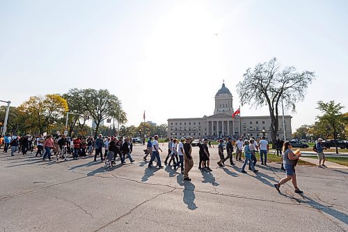 MIKE DEAL / WINNIPEG FREE PRESS
Hundreds of protesters walk along Broadway arriving at the Manitoba Legislative building from The Forks they took part in the Hands Off Our Kids' national &quot;1 Million March 4 Children&quot; event.
Anti-trans protesters and Trans Rights supporters gather at the Manitoba Legislative building Wednesday morning.
230920 - Wednesday, September 20, 2023.