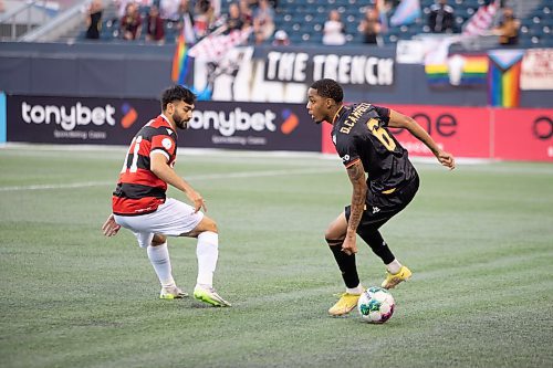 BROOK JONES / WINNIPEG FREE PRESS
Valour FC played to a 1-0 loss against Vancouver FC in Canadian Premier League action at IG Field in Winnipeg, Man., Wednesday, Sept 20, 2023. Pictured: Valour FC midfielder Dante Campbell controls the soccer ball as Vancouver FC attacker Gabriel Bitar looks on during first half play.