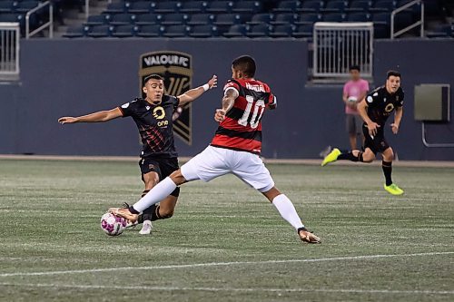 BROOK JONES / WINNIPEG FREE PRESS
Valour FC played to a 1-0 loss against Vancouver FC in Canadian Premier League action at IG Field in Winnipeg, Man., Wednesday, Sept 20, 2023. Pictured: Valour FC midfielder Juan Pablo Sanchez fights for the soccer ball against Vancouver FC attacker Shaan Singh Hundal during first half play. 