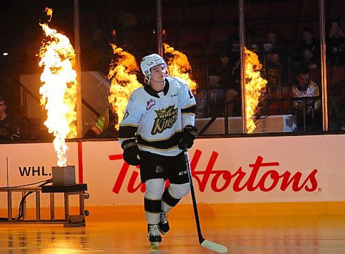 Joby Baumuller skates out as flames shoot up behind him during player introductions ahead of the Brandon Wheat Kings' Western Hockey League opener against the Regina Pats at Westoba Place on Friday. (Thomas Friesen/The Brandon Sun)