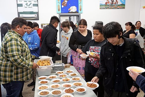 22092023
Students are served up food during a fall feast at Sioux Valley High School in Brandon on Friday. The feast was followed by drumming and a round dance. (Tim Smith/The Brandon Sun)