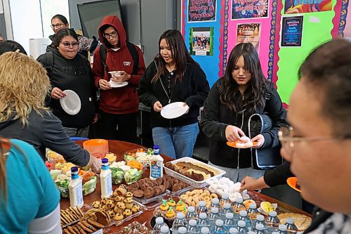 22092023
Students help themselves to food at a fall feast at Sioux Valley High School in Brandon on Friday. The feast was followed by drumming and a round dance. (Tim Smith/The Brandon Sun)