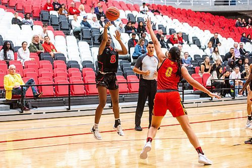 MIKAELA MACKENZIE / WINNIPEG FREE PRESS

Wesmen Jazmin Birch (8) makes a shot as Dino Mya Proctor (0) blocks during an inter squad basketball game at the Duckworth Centre on Friday, Sept. 22, 2023. For Taylor Allen story.
Winnipeg Free Press 2023