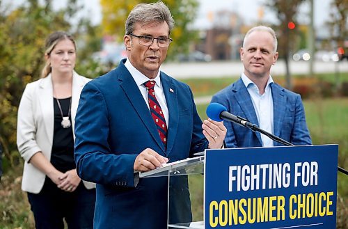 JOHN WOODS / WINNIPEG FREE PRESS
PC candidates Kevin Klein and Rick Shone with supporters announced that their party will bring in the sale of liquor in grocery stores as they gathered in a field across from Kenaston Common shopping area in Winnipeg Sunday, September  24, 2023. 

Reporter: kitching